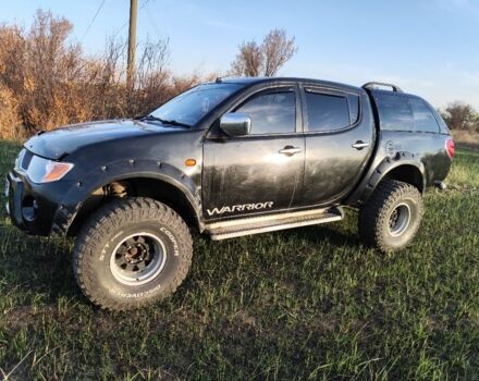 Черный Мицубиси Л 200, объемом двигателя 0 л и пробегом 160 тыс. км за 7578 $, фото 3 на Automoto.ua