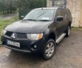 Черный Мицубиси Л 200, объемом двигателя 2.5 л и пробегом 367 тыс. км за 7085 $, фото 1 на Automoto.ua