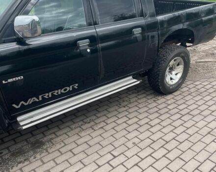 Мицубиси Л 200 2006 в Белой Церкве на Automoto.ua Черный Мицубиси Л 200, объемом двигателя 0 л и пробегом 300 тыс. км за 4500 $, фото 2 на Automoto.ua