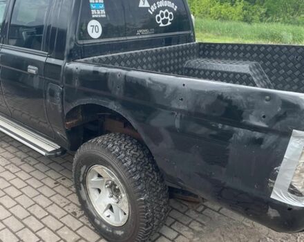 Мицубиси Л 200 2006 в Белой Церкве на Automoto.ua Черный Мицубиси Л 200, объемом двигателя 0 л и пробегом 300 тыс. км за 4500 $, фото 4 на Automoto.ua