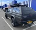 Чорний Міцубісі Л 200, об'ємом двигуна 2.5 л та пробігом 170 тис. км за 6100 $, фото 1 на Automoto.ua