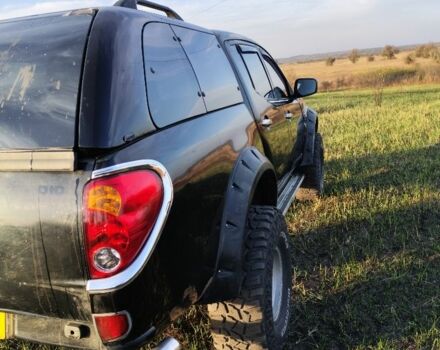 Черный Мицубиси Л 200, объемом двигателя 0 л и пробегом 160 тыс. км за 7578 $, фото 1 на Automoto.ua