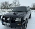 Чорний Міцубісі Л 200, об'ємом двигуна 2.48 л та пробігом 413 тис. км за 10500 $, фото 1 на Automoto.ua