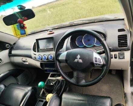 Черный Мицубиси Л 200, объемом двигателя 0 л и пробегом 163 тыс. км за 8057 $, фото 8 на Automoto.ua