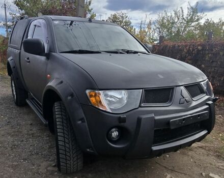 Чорний Міцубісі Л 200, об'ємом двигуна 2.5 л та пробігом 226 тис. км за 7200 $, фото 1 на Automoto.ua