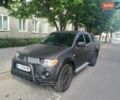 Черный Мицубиси Л 200, объемом двигателя 2.48 л и пробегом 390 тыс. км за 11999 $, фото 1 на Automoto.ua
