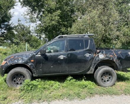 Черный Мицубиси Л 200, объемом двигателя 2.5 л и пробегом 300 тыс. км за 4311 $, фото 1 на Automoto.ua