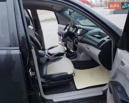 Чорний Міцубісі Л 200, об'ємом двигуна 2.48 л та пробігом 290 тис. км за 9900 $, фото 14 на Automoto.ua