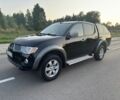 Черный Мицубиси Л 200, объемом двигателя 2.5 л и пробегом 210 тыс. км за 5455 $, фото 1 на Automoto.ua