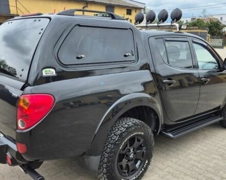 Черный Мицубиси Л 200, объемом двигателя 2.5 л и пробегом 278 тыс. км за 4200 $, фото 4 на Automoto.ua