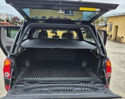 Черный Мицубиси Л 200, объемом двигателя 2.5 л и пробегом 278 тыс. км за 4200 $, фото 7 на Automoto.ua