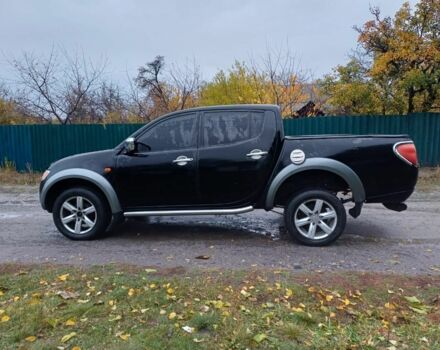 Черный Мицубиси Л 200, объемом двигателя 2.5 л и пробегом 170 тыс. км за 5900 $, фото 4 на Automoto.ua