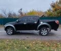 Черный Мицубиси Л 200, объемом двигателя 2.5 л и пробегом 170 тыс. км за 5900 $, фото 4 на Automoto.ua