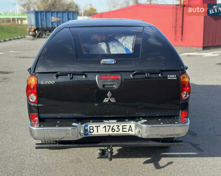 Мицубиси Л 200 2007 в Киеве на Automoto.ua Черный Мицубиси Л 200, объемом двигателя 2.48 л и пробегом 283 тыс. км за 10999 $, фото 4 на Automoto.ua