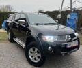 Черный Мицубиси Л 200, объемом двигателя 2.5 л и пробегом 195 тыс. км за 3400 $, фото 1 на Automoto.ua