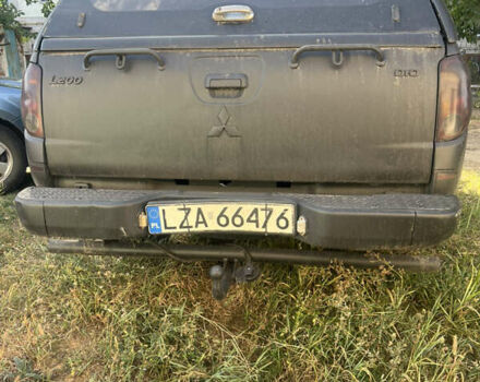 Міцубісі Л 200 2007 у Павлограде на Automoto.ua Чорний Міцубісі Л 200, об'ємом двигуна 2.5 л та пробігом 287 тис. км за 8500 $, фото 4 на Automoto.ua