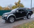 Черный Мицубиси Л 200, объемом двигателя 2.5 л и пробегом 170 тыс. км за 5900 $, фото 3 на Automoto.ua