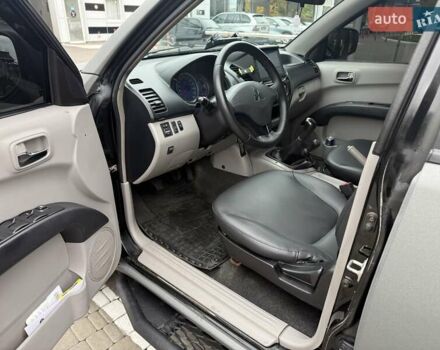 Чорний Міцубісі Л 200, об'ємом двигуна 2.48 л та пробігом 232 тис. км за 14000 $, фото 11 на Automoto.ua