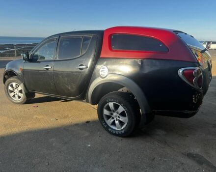 Черный Мицубиси Л 200, объемом двигателя 2 л и пробегом 209 тыс. км за 5803 $, фото 6 на Automoto.ua