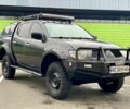 Черный Мицубиси Л 200, объемом двигателя 2.5 л и пробегом 185 тыс. км за 13500 $, фото 1 на Automoto.ua