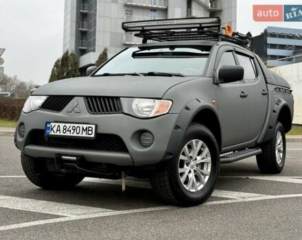 Черный Мицубиси Л 200, объемом двигателя 2.48 л и пробегом 232 тыс. км за 13900 $, фото 1 на Automoto.ua