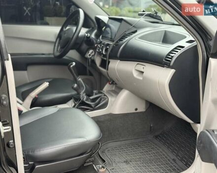 Чорний Міцубісі Л 200, об'ємом двигуна 2.48 л та пробігом 232 тис. км за 14000 $, фото 13 на Automoto.ua