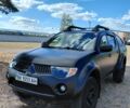 Чорний Міцубісі Л 200, об'ємом двигуна 2.4 л та пробігом 262 тис. км за 15000 $, фото 1 на Automoto.ua