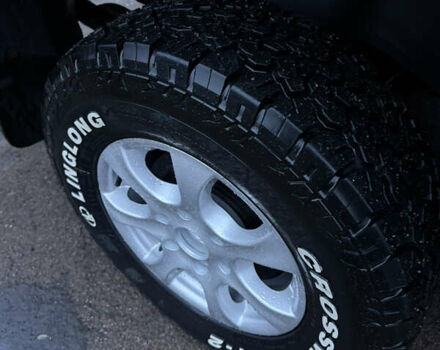 Черный Мицубиси Л 200, объемом двигателя 2.5 л и пробегом 199 тыс. км за 11800 $, фото 3 на Automoto.ua