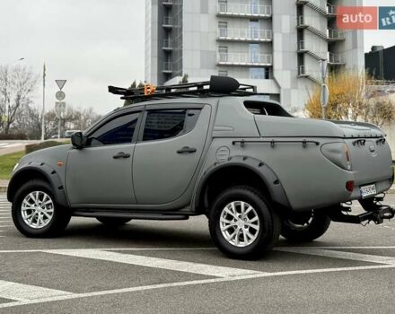 Черный Мицубиси Л 200, объемом двигателя 2.48 л и пробегом 232 тыс. км за 13900 $, фото 6 на Automoto.ua