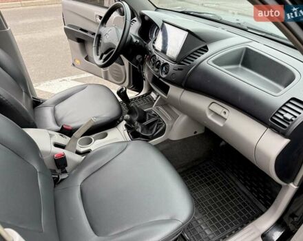 Черный Мицубиси Л 200, объемом двигателя 2.48 л и пробегом 232 тыс. км за 13900 $, фото 40 на Automoto.ua