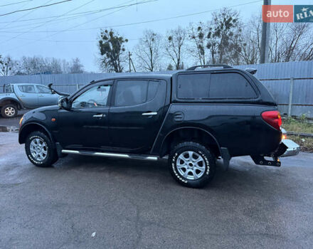 Черный Мицубиси Л 200, объемом двигателя 2.5 л и пробегом 199 тыс. км за 11800 $, фото 12 на Automoto.ua