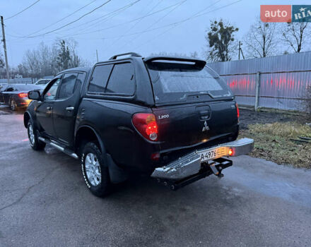 Черный Мицубиси Л 200, объемом двигателя 2.5 л и пробегом 199 тыс. км за 11800 $, фото 9 на Automoto.ua