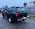 Черный Мицубиси Л 200, объемом двигателя 2.5 л и пробегом 199 тыс. км за 11800 $, фото 9 на Automoto.ua