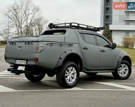 Черный Мицубиси Л 200, объемом двигателя 2.48 л и пробегом 232 тыс. км за 13900 $, фото 16 на Automoto.ua