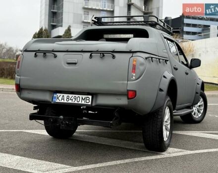 Черный Мицубиси Л 200, объемом двигателя 2.48 л и пробегом 232 тыс. км за 13900 $, фото 13 на Automoto.ua