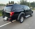 Черный Мицубиси Л 200, объемом двигателя 2.5 л и пробегом 210 тыс. км за 5455 $, фото 3 на Automoto.ua