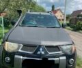 Черный Мицубиси Л 200, объемом двигателя 2.5 л и пробегом 300 тыс. км за 4311 $, фото 1 на Automoto.ua