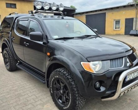 Черный Мицубиси Л 200, объемом двигателя 2.5 л и пробегом 278 тыс. км за 4200 $, фото 1 на Automoto.ua