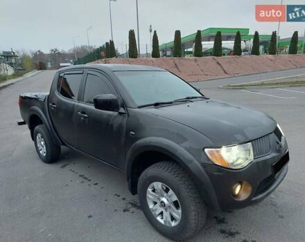 Чорний Міцубісі Л 200, об'ємом двигуна 2.48 л та пробігом 290 тис. км за 9900 $, фото 1 на Automoto.ua