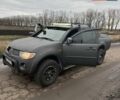Черный Мицубиси Л 200, объемом двигателя 2.5 л и пробегом 500 тыс. км за 9300 $, фото 5 на Automoto.ua