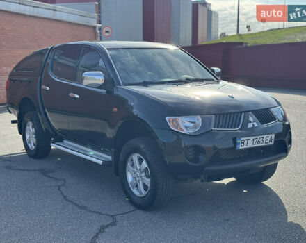 Мицубиси Л 200 2007 в Киеве на Automoto.ua Черный Мицубиси Л 200, объемом двигателя 2.48 л и пробегом 283 тыс. км за 10999 $, фото 7 на Automoto.ua