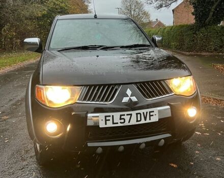 Черный Мицубиси Л 200, объемом двигателя 2.5 л и пробегом 190 тыс. км за 6655 $, фото 3 на Automoto.ua