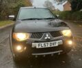 Черный Мицубиси Л 200, объемом двигателя 2.5 л и пробегом 190 тыс. км за 6655 $, фото 3 на Automoto.ua