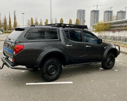 Черный Мицубиси Л 200, объемом двигателя 2.5 л и пробегом 185 тыс. км за 13500 $, фото 2 на Automoto.ua