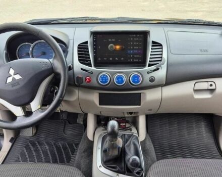 Черный Мицубиси Л 200, объемом двигателя 2.5 л и пробегом 278 тыс. км за 4200 $, фото 5 на Automoto.ua