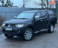 Черный Мицубиси Л 200, объемом двигателя 2.5 л и пробегом 199 тыс. км за 11800 $, фото 17 на Automoto.ua
