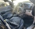 Черный Мицубиси Л 200, объемом двигателя 2 л и пробегом 209 тыс. км за 5803 $, фото 2 на Automoto.ua
