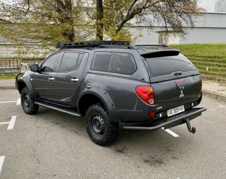 Черный Мицубиси Л 200, объемом двигателя 2.5 л и пробегом 185 тыс. км за 13500 $, фото 3 на Automoto.ua