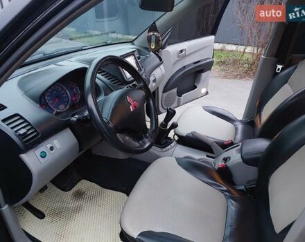 Чорний Міцубісі Л 200, об'ємом двигуна 2.48 л та пробігом 290 тис. км за 9900 $, фото 6 на Automoto.ua