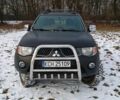Черный Мицубиси Л 200, объемом двигателя 2.5 л и пробегом 214 тыс. км за 2850 $, фото 1 на Automoto.ua